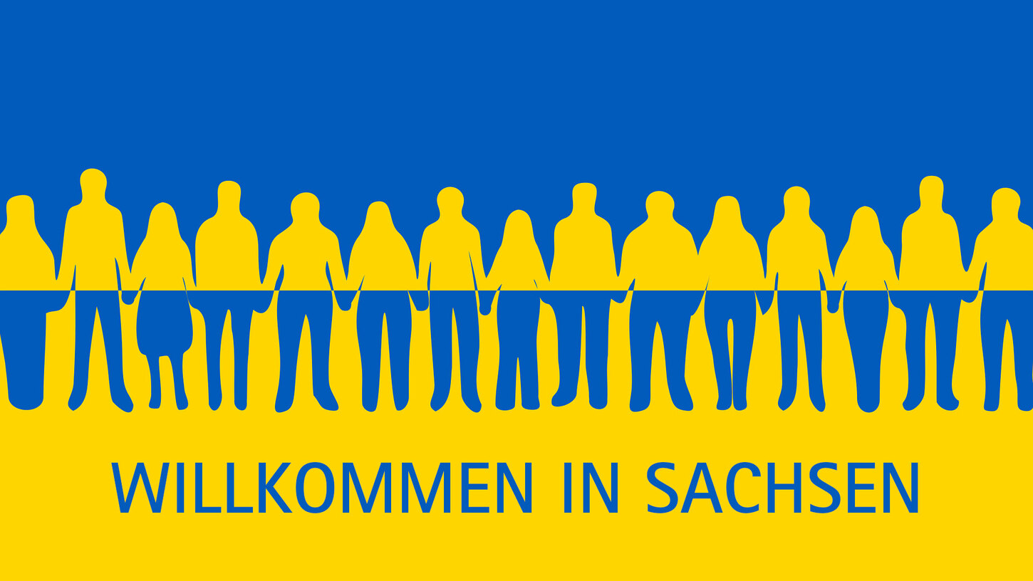 Ukrainische Flagge mit Aufschrift "Willkommen in Sachsen"