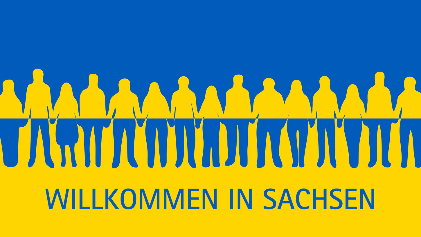 Ukrainische Flagge mit Aufschrift "Willkommen in Sachsen"